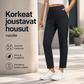 Korkeat joustavat housut naisille, joissa on taskut vetoketjun kanssa