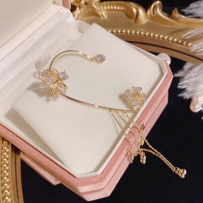 Riippuvat perhoskorvakorut