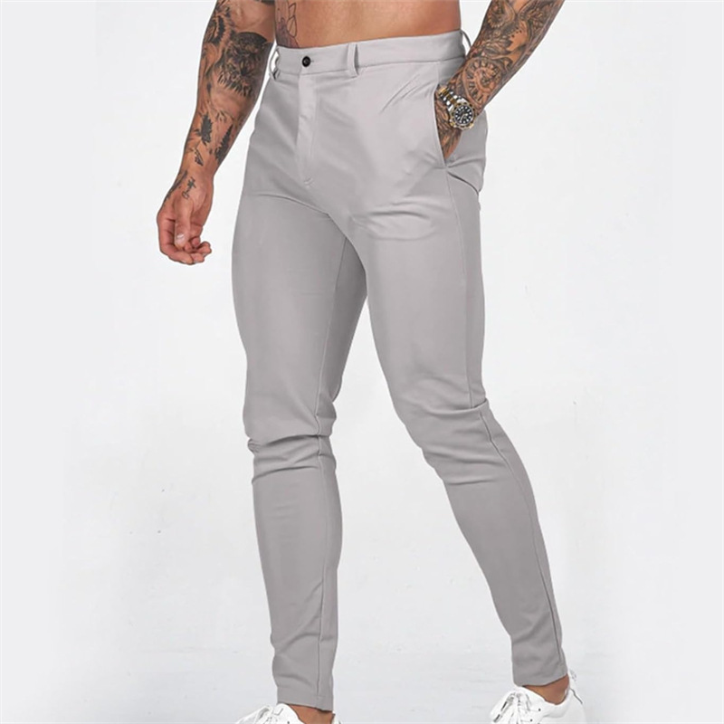 Miesten rennot, joustavat, kapenevat slim fit -housut