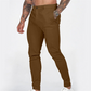 Miesten rennot, joustavat, kapenevat slim fit -housut