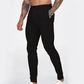 Miesten rennot, joustavat, kapenevat slim fit -housut